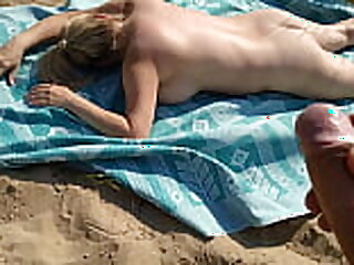 Big Dick Guy Jerks Cock Near Sunbathing Nude Beach Big Boobs Milf and He Massive Cumshot Near Her Body 5 min